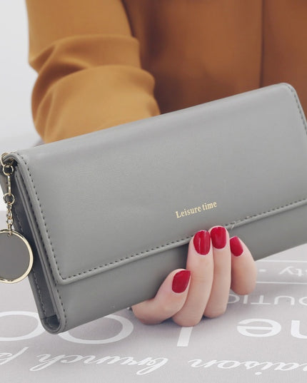 Women's hand holding wallet female long section new Japanese and Korean personality pendant multi-function student wallet