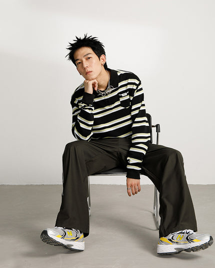 Basic knitted polo shirt with small pockets and stripes
