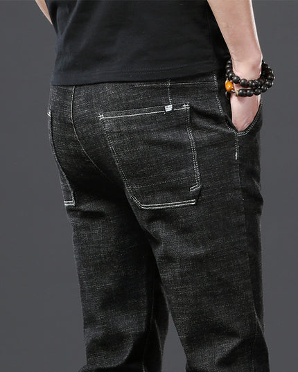 Stretch Loose Men Plus Flint Jeans Korean version popular logo slim skinny leg pants long pants black Haren pants