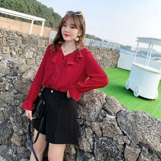 Women's ruffled shirt