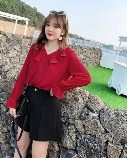 Women's ruffled shirt