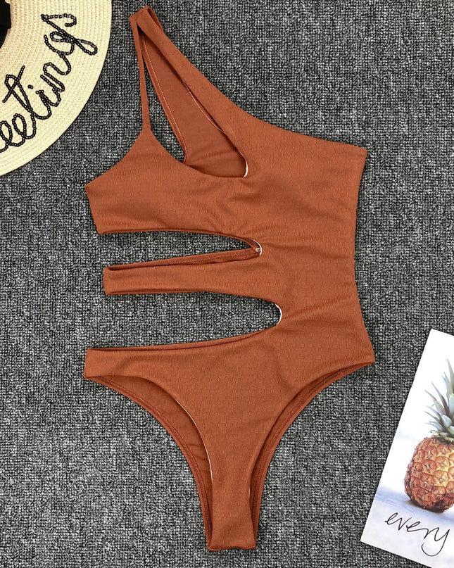 Sexy irregular stitching cutout one-piece bikini