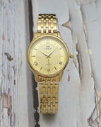 Gold / Woman