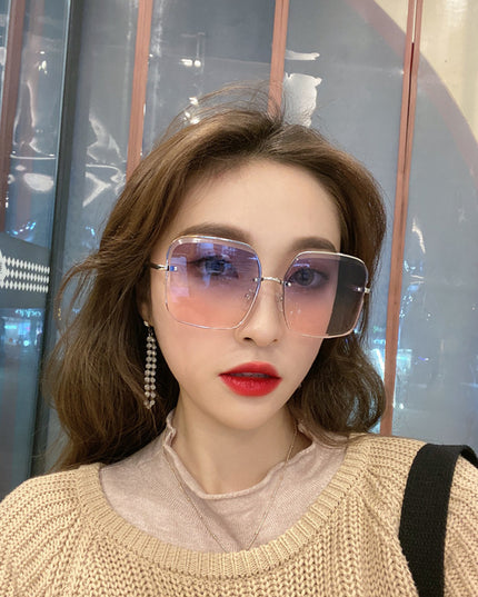 Rimless cut square sunglasses for women