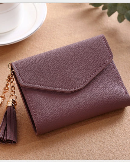Women's short Korean version of the bag Tassel pendant lychee wallet multi-card position Clutch bag