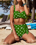 White dots on green background