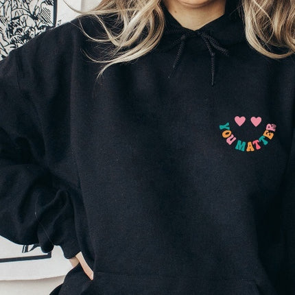Women's Oversized Hoodie With Text On The Back Of Winter
